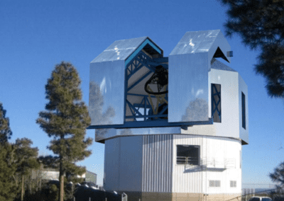 a large metal structure with a telescope